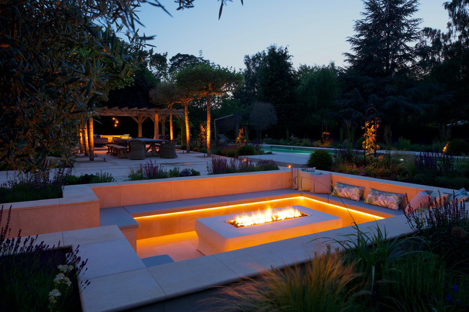 firepit lit with garden lighting Tim Miller Garden Design